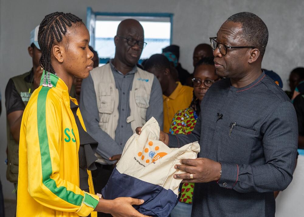 UNFPA West and Central Africa Regional Director with an adolescent girl in Liberia