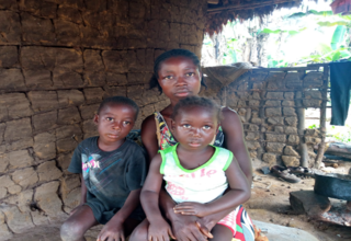 A teenage mother along with her two children in Liberia