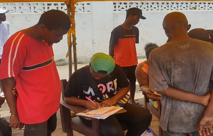 At-Risk youth on drugs queue to join rehabilitation programme by the Government of Liberia and the United Nations.
